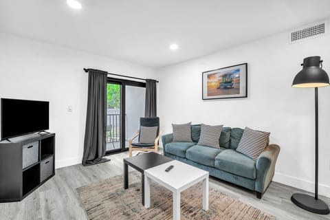 Enjoy your favorite shows and movies, or unwind in the roomy living area featuring comfortable seating and a large, streaming-ready widescreen TV.