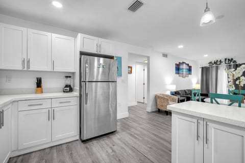 For your convenience, the kitchen includes a refrigerator where you can store your groceries.