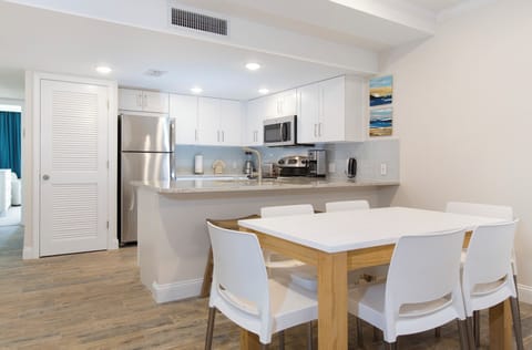 Share easy meals around a modern table for four.