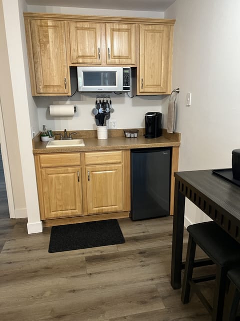 Kitchenette with mini-fridge, microwave, & portable electric 2-burner