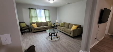 Living room and Den with Roku TV