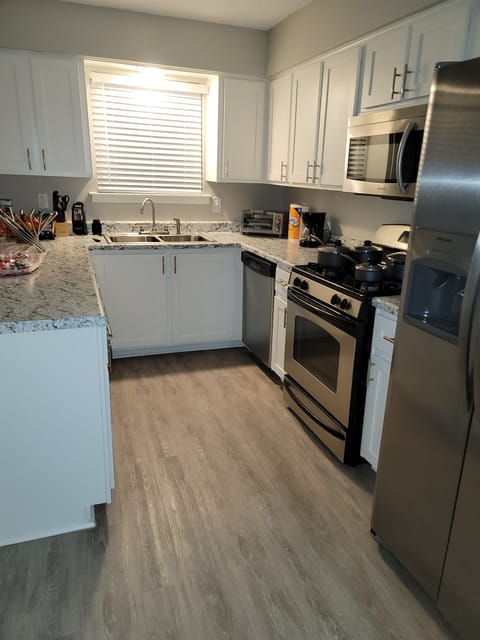 Kitchen with amenities (blender, pots, food, coffee, etc.)