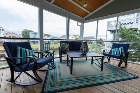 Screen porch overlooking canal