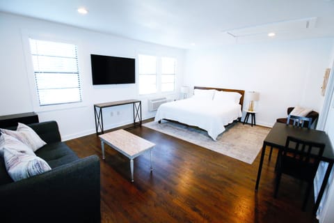 Large living space with 65" LG Smart TV, King size memory foam bed!