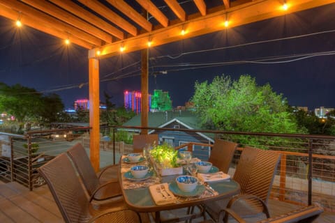 Evening dining on the spacious deck looking out to downtown Reno