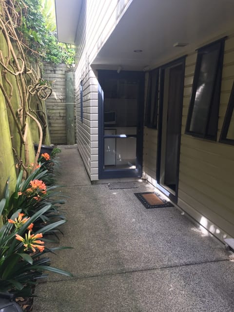 The entry path, shared with next-door unit