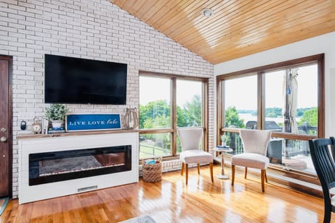 Flat screen TV, fireplace and lake views make you feel right at home