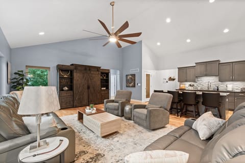 There are 7 recliners in the living room, so kick those feet up and relax.