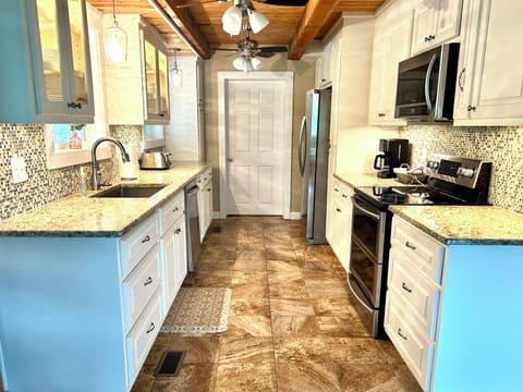 Updated, well-equipped kitchen. 