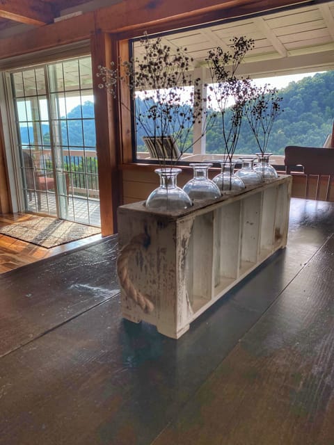 9 foot custom dining table with long benches and 2 chairs. 