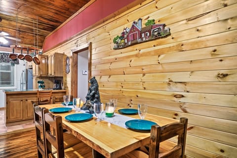 Table seats six. We provide plates, bowls, cups, glasses, and silverware