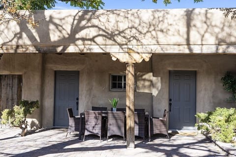 Patio with dining table and chairs