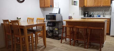 kitchen table with 3 barstools