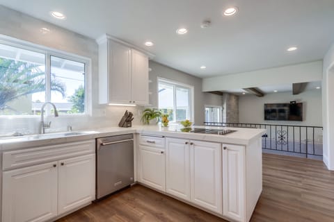 Beautifully Upgraded Kitchen with Stainless Steel Appliances view 2 - Looking into Living Room