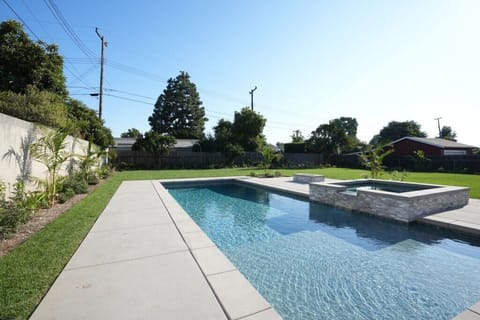 Sparkling In-ground Pool and Jacuzzi