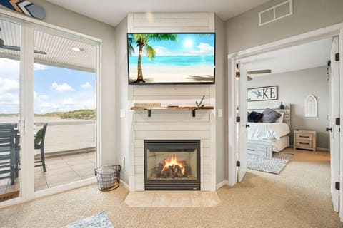Enjoy the Large Screen TV and the Gas Fireplace