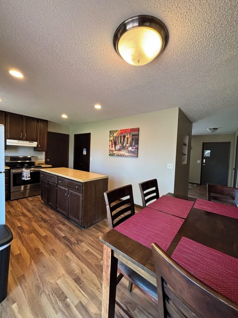 Kitchen equipped with dishes and cookware