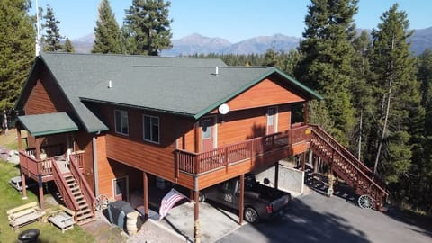 The Whitetail View apartment has two doors to the balcony with a great view of the Swan mountains. 