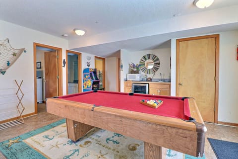 Head to Game Room with a Pool Table, Wet Bar, and Arcade Game System for even more fun during your stay!