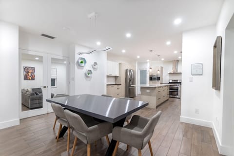 Elegant dining table next to the kitchen.