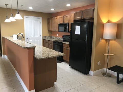 Our spacious galley kitchen includes dishes, pots/pans, toaster and a coffee pot