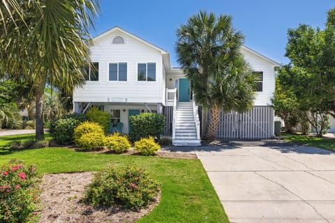 Welcome to Sandy Cheeks, a fully renovated 6-bedroom, 4-bathroom home on the elite Isle of Palms