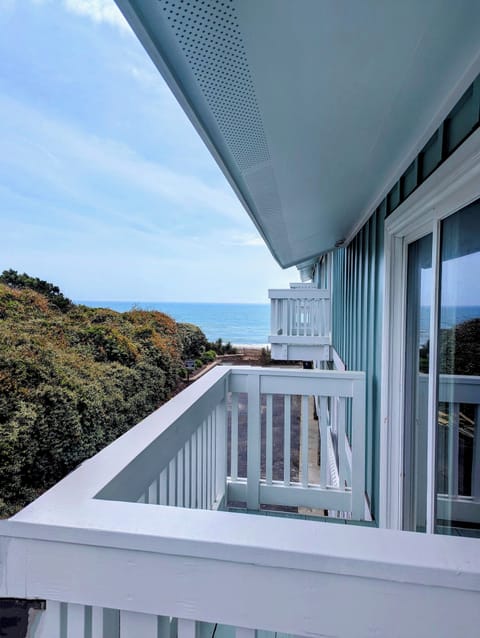 View of the beach from master bedroom balcony