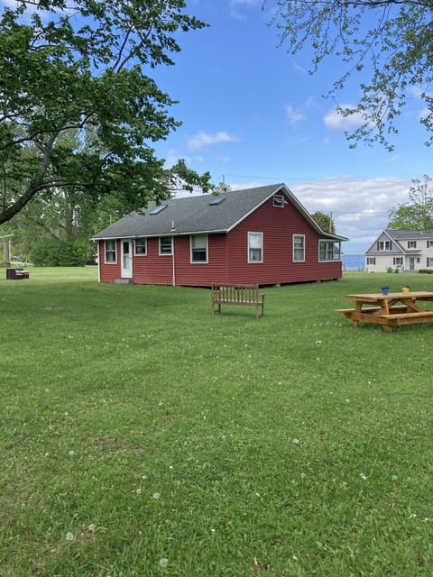 Back and right side yard. New cedar picnic table