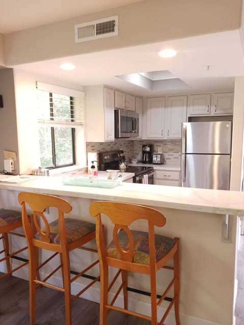 Bar Seating and Kitchen