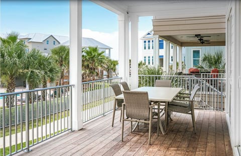 main floor balcony, over looks pool area, and beach views