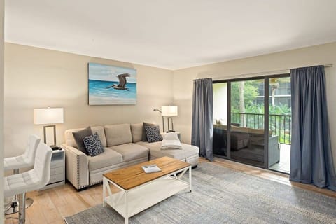 Spacious living room, with futon bed pictured.