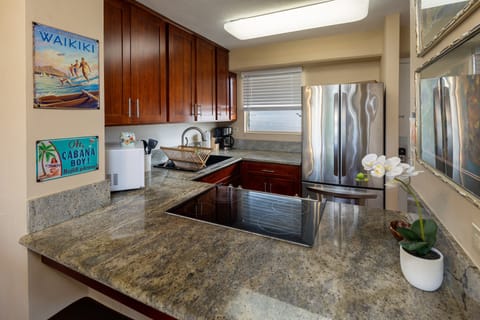 Kitchen area with Granite countertops.