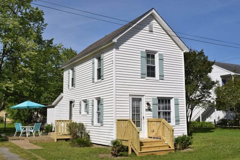 Enjoy this quiet, yet delightfully updated Chincoteague-style home.