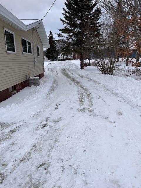 Side of the house cleared for trailer parking