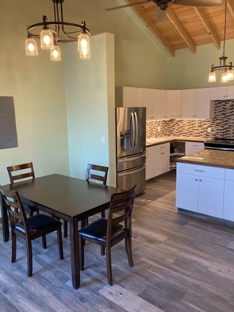 Dining area. Additional table and chairs in closet