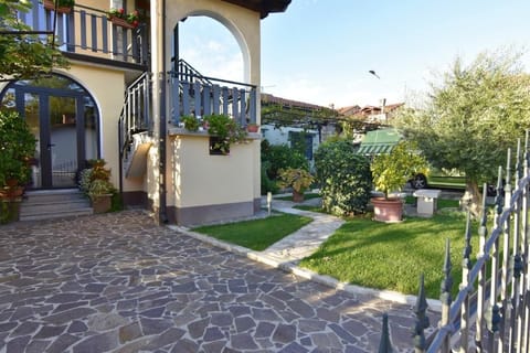 The front of the house with enclosed garden.