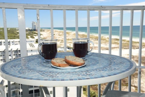 Enjoy a beach view while having beakfast on your private balcony