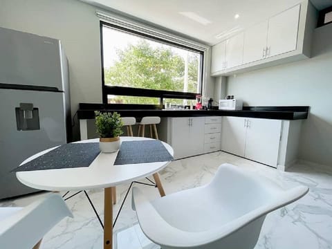 Two people breakfast table and kitchen