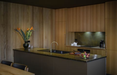 Brass kitchen bench and splashback