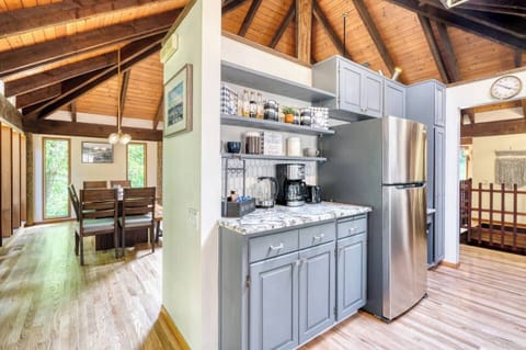 Fully Stocked Kitchen: 12+ place settings, Coffee mugs, Wine glasses, Shot glasses, Crockpot, Ice Machine, Blender & lots of serving platters.