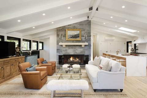 Built in bar off living room with ice maker.  Vaulted ceilings and open space.