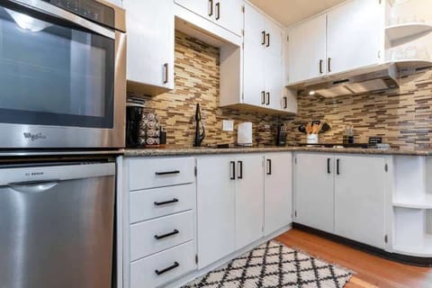 Fully stocked kitchen with updated appliances. Everything you need for family meals