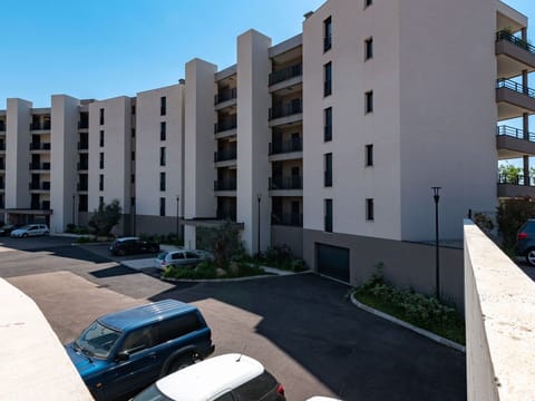 Building, Property, Sky, Car, Vehicle, Window, Tower Block, Urban Design, Neighbourhood, Condominium