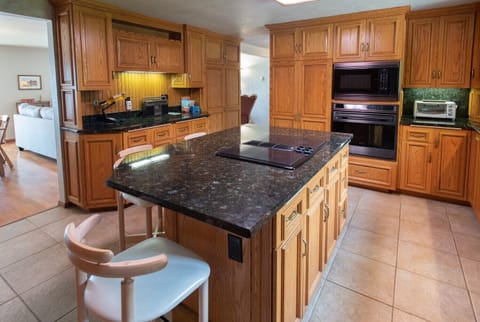 Another kitchen view out to dining area.