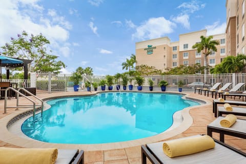 Dive into the sparkling pool and lounge in the sunshine.