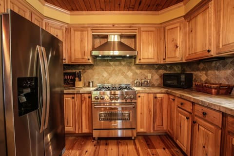Kitchen with gas stove and oven.  