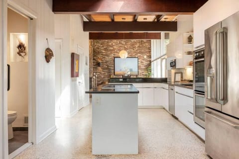 Kitchen looking on from the family room towards the formal dining room
