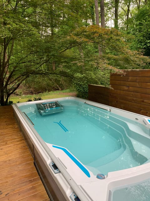 Pool with attached hot tub