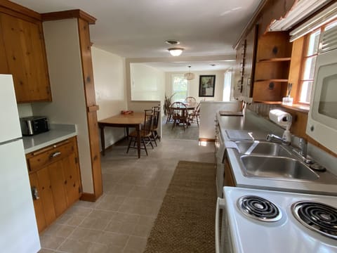 Lots of seating and large eating area. Slider to back yard and patio.