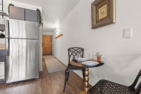 The dining table offers seating for two guests.